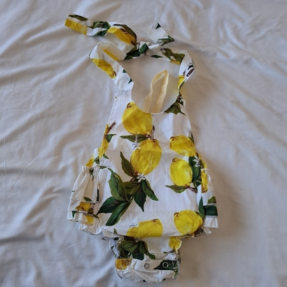 PrincesasA lemon romper with headband NWT size Small
